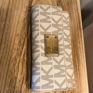 Michael Kors tri fold wallet